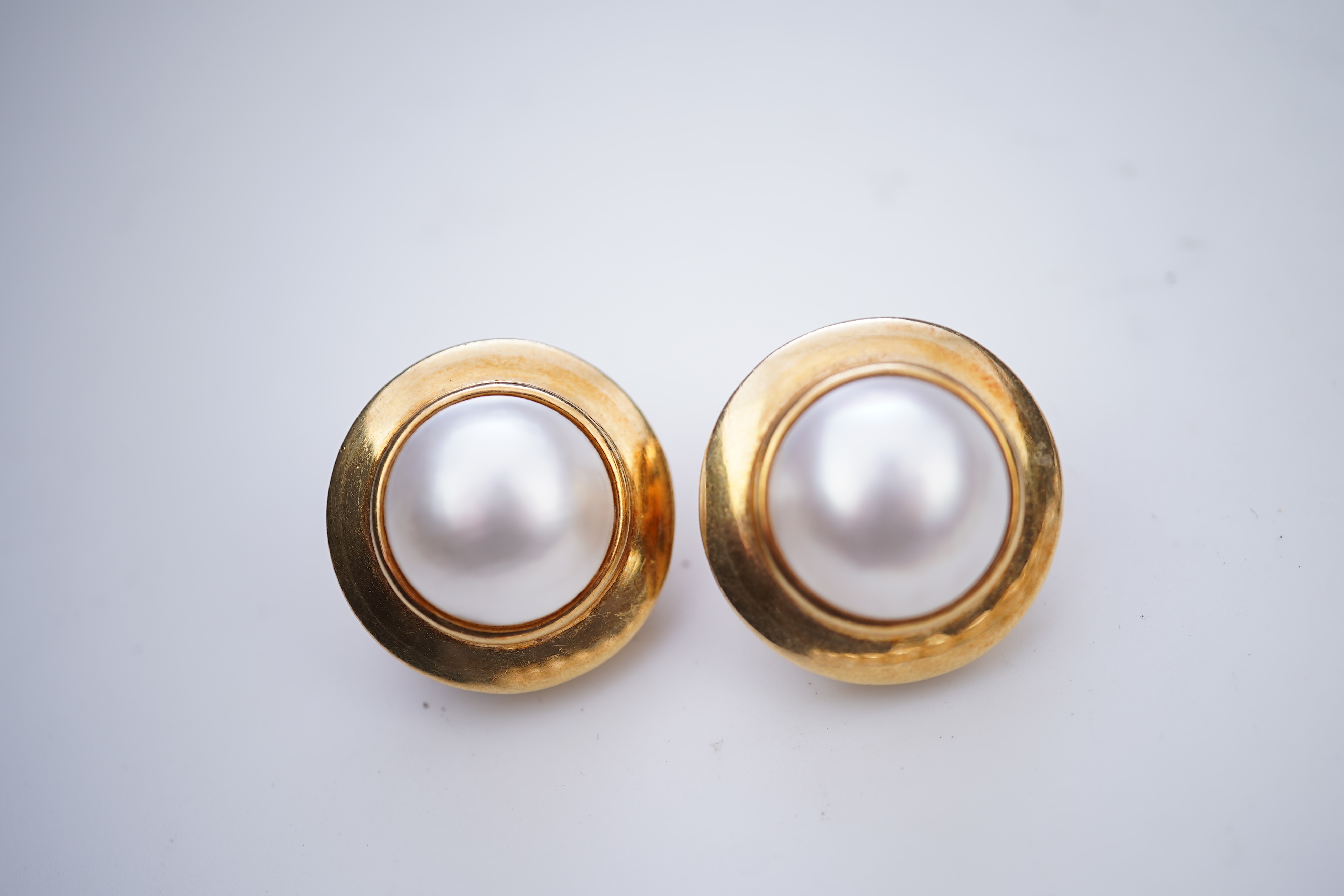 A cultured pearl necklace and pair of mabé cultured pearl ear clips